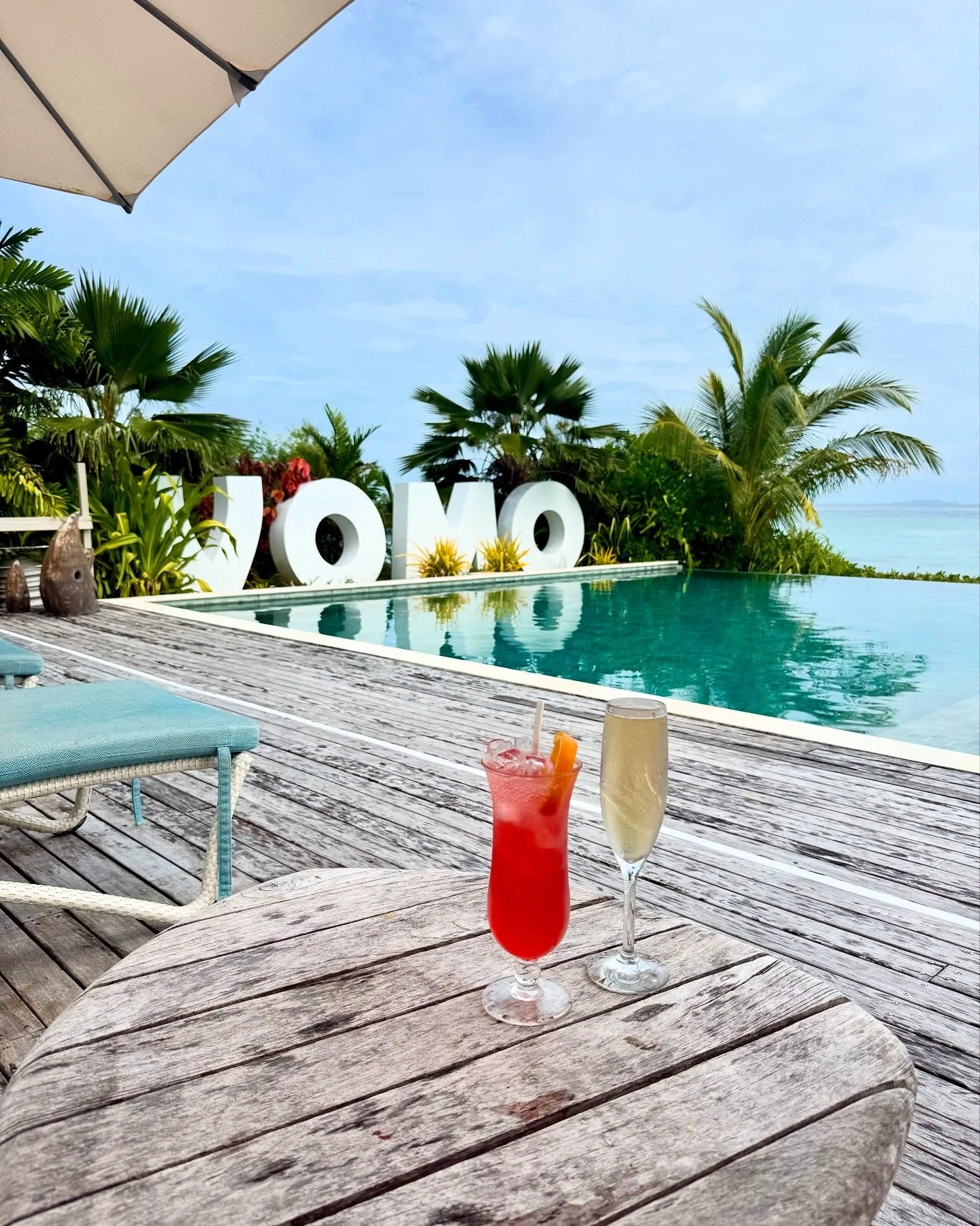 Poolside cocktails at VOMO Island Fiji — original photography from the published article